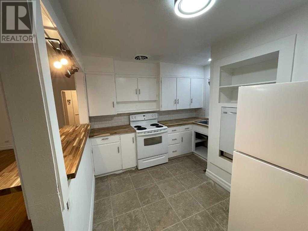 Single Family House Bungalow for Sale in  A Street S Victoria Park Lethbridge 