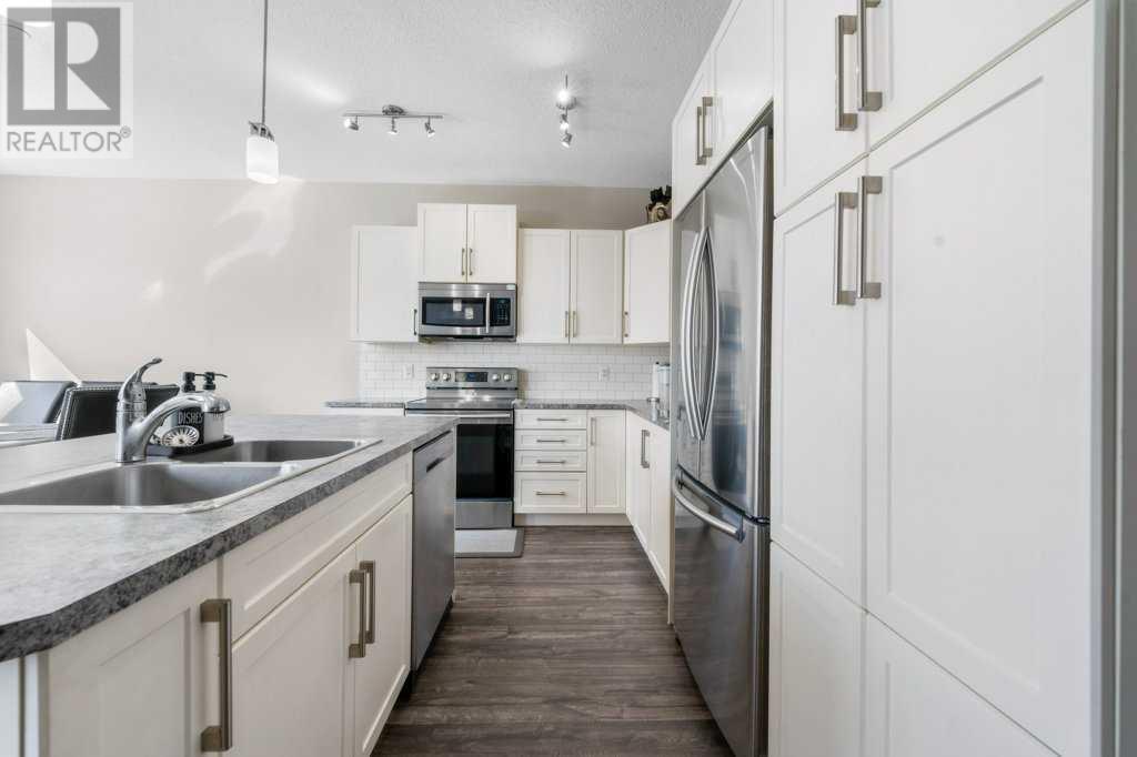 Single Family House 4 Level for Sale in  Howse Manor NE Livingston Calgary 