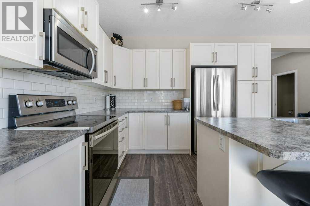 Single Family House 4 Level for Sale in  Howse Manor NE Livingston Calgary 