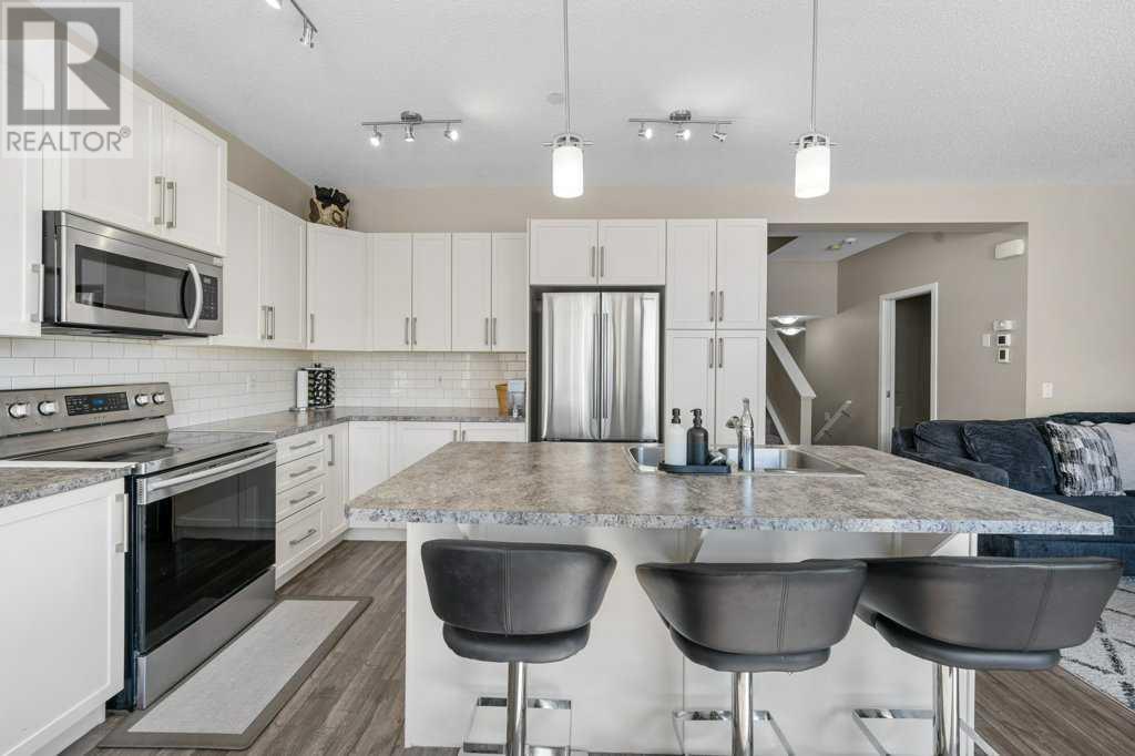 Single Family House 4 Level for Sale in  Howse Manor NE Livingston Calgary 