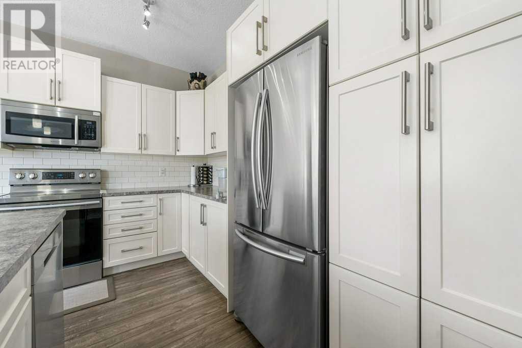 Single Family House 4 Level for Sale in  Howse Manor NE Livingston Calgary 