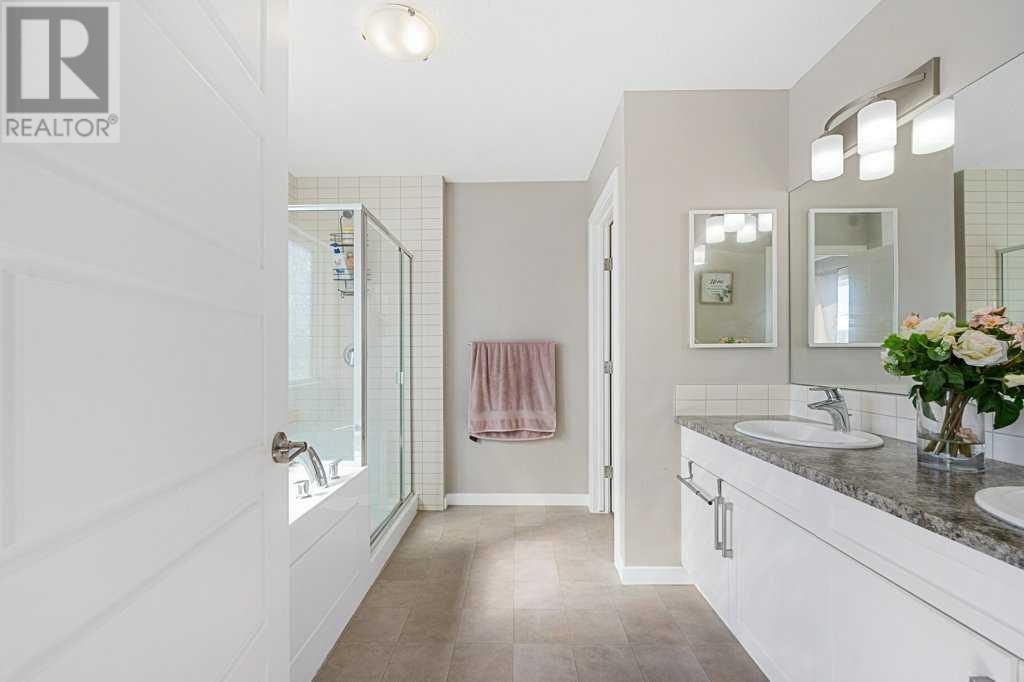 Single Family House 4 Level for Sale in  Howse Manor NE Livingston Calgary 