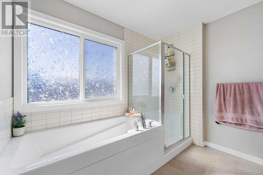 Single Family House 4 Level for Sale in  Howse Manor NE Livingston Calgary 