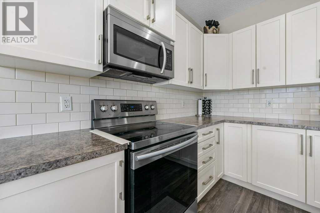 Single Family House 4 Level for Sale in  Howse Manor NE Livingston Calgary 