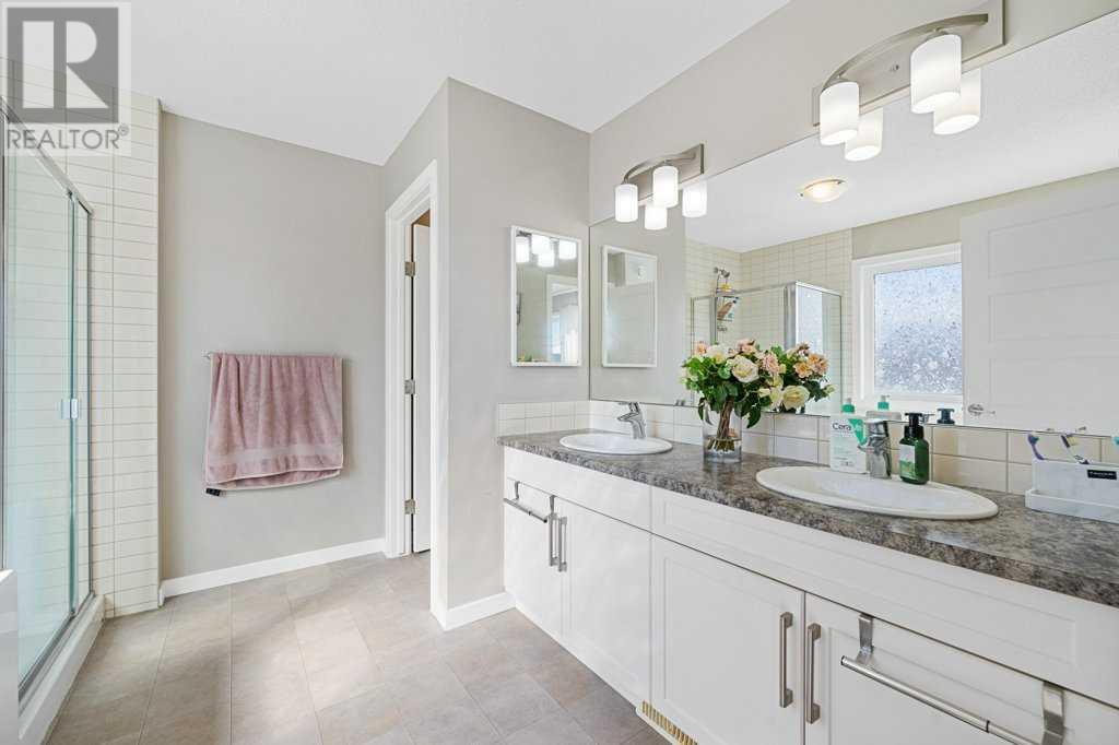 Single Family House 4 Level for Sale in  Howse Manor NE Livingston Calgary 