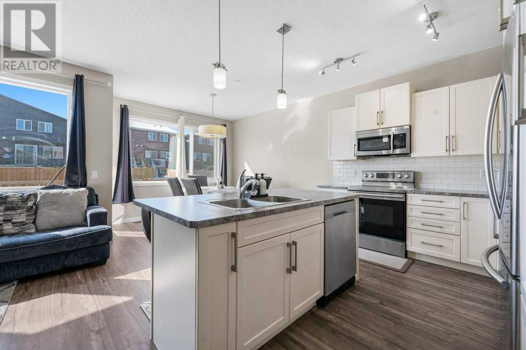 Single Family House 4 Level for Sale in  Howse Manor NE Livingston Calgary 