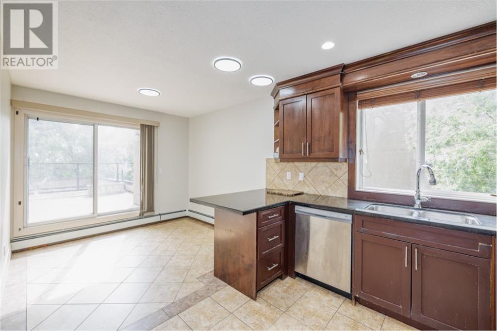 Single Family House Multi-level for Sale in   Village Mews SW Patterson Calgary 
