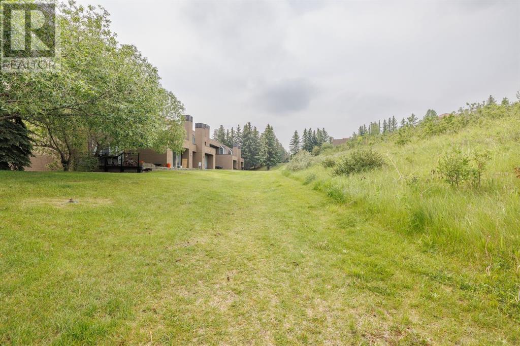 Single Family House Multi-level for Sale in   Village Mews SW Patterson Calgary 