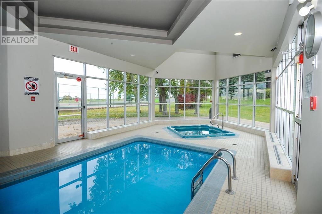 Single Family House Multi-level for Sale in   Village Mews SW Patterson Calgary 