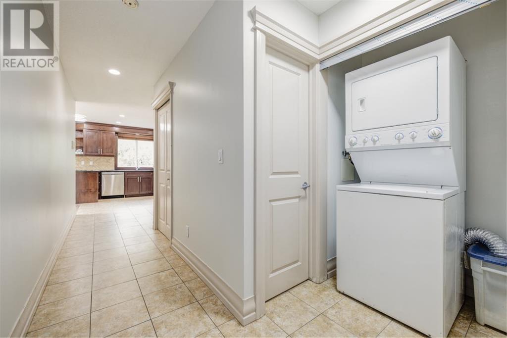 Single Family House Multi-level for Sale in   Village Mews SW Patterson Calgary 