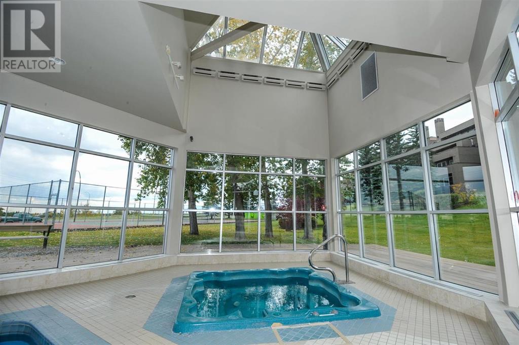 Single Family House Multi-level for Sale in   Village Mews SW Patterson Calgary 
