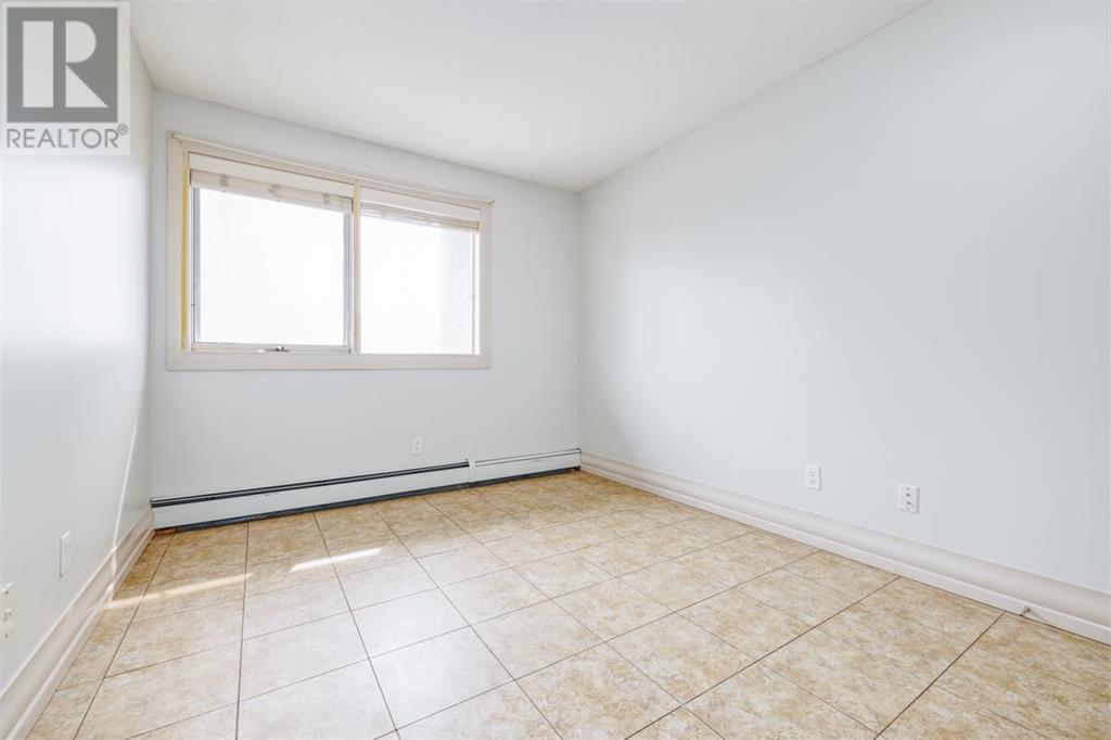 Single Family House Multi-level for Sale in   Village Mews SW Patterson Calgary 