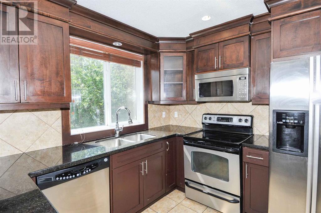 Single Family House Multi-level for Sale in   Village Mews SW Patterson Calgary 