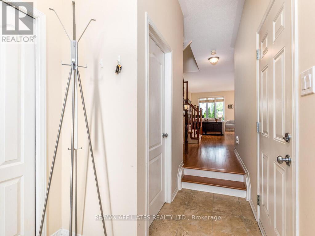 Spacious hall with powder room & entry to garage!