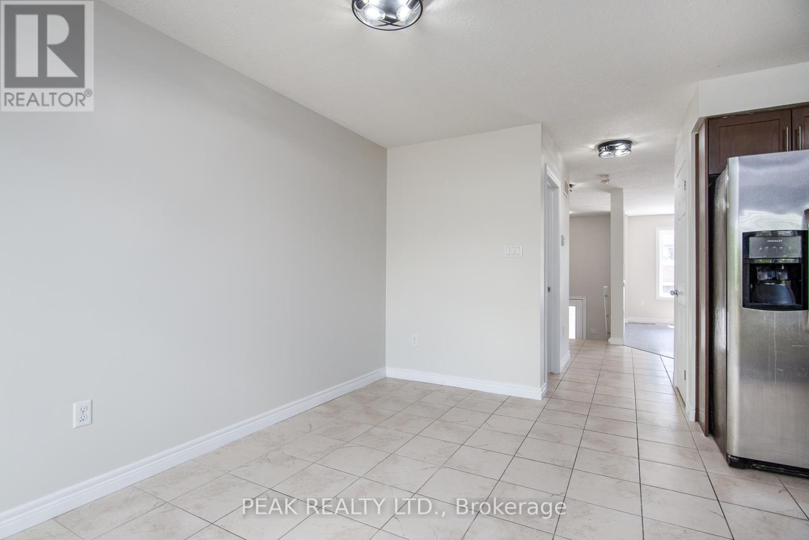Photo 10 of J 3 70 Willowrun Drive, Kitchener ON