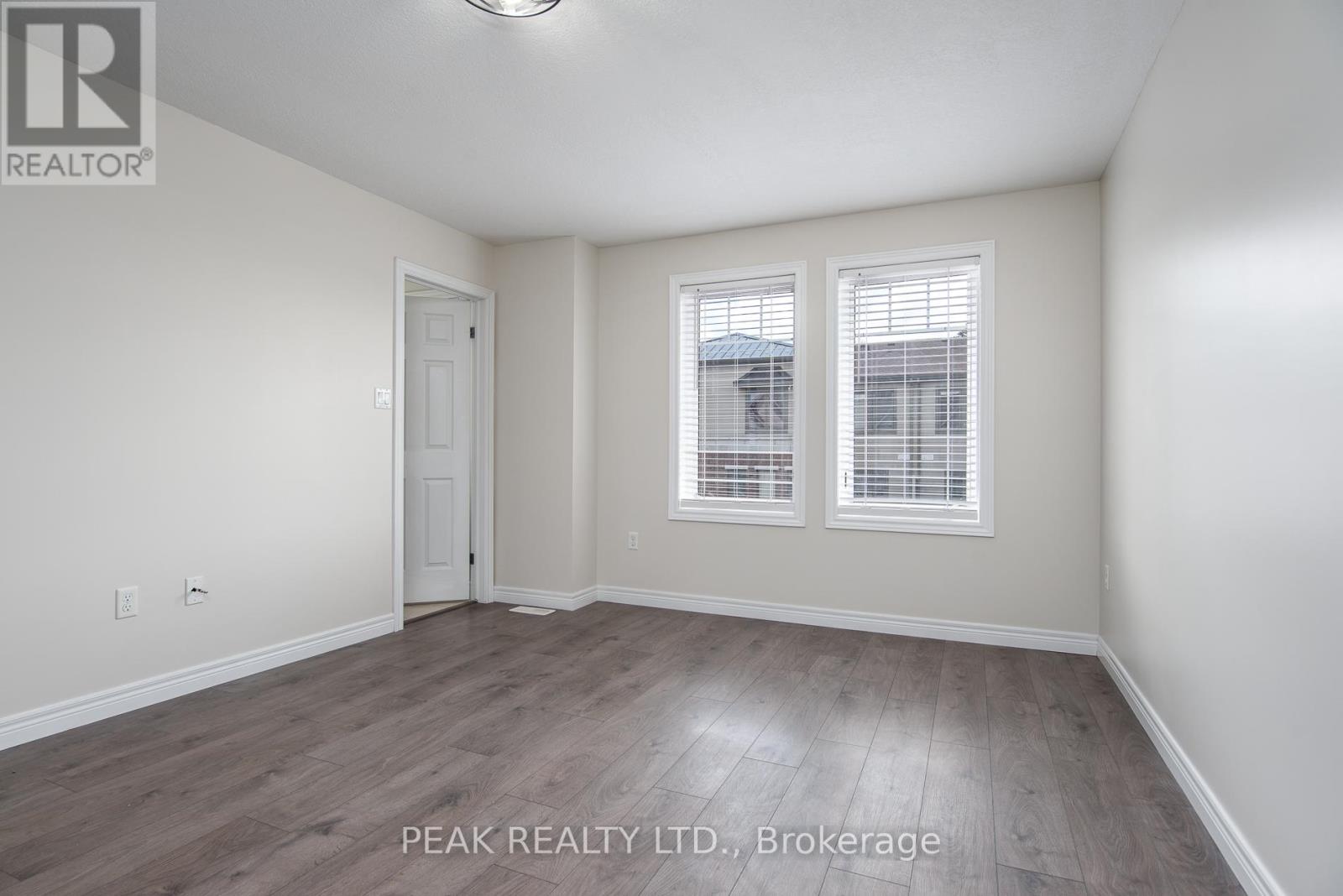 Photo 11 of J 3 70 Willowrun Drive, Kitchener ON