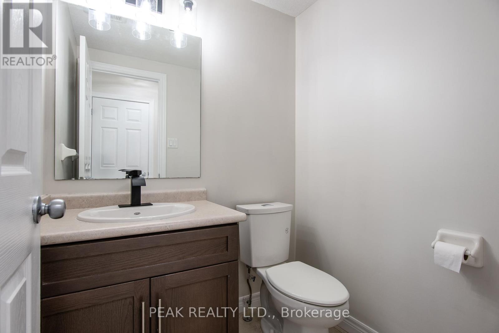 Photo 12 of J 3 70 Willowrun Drive, Kitchener ON