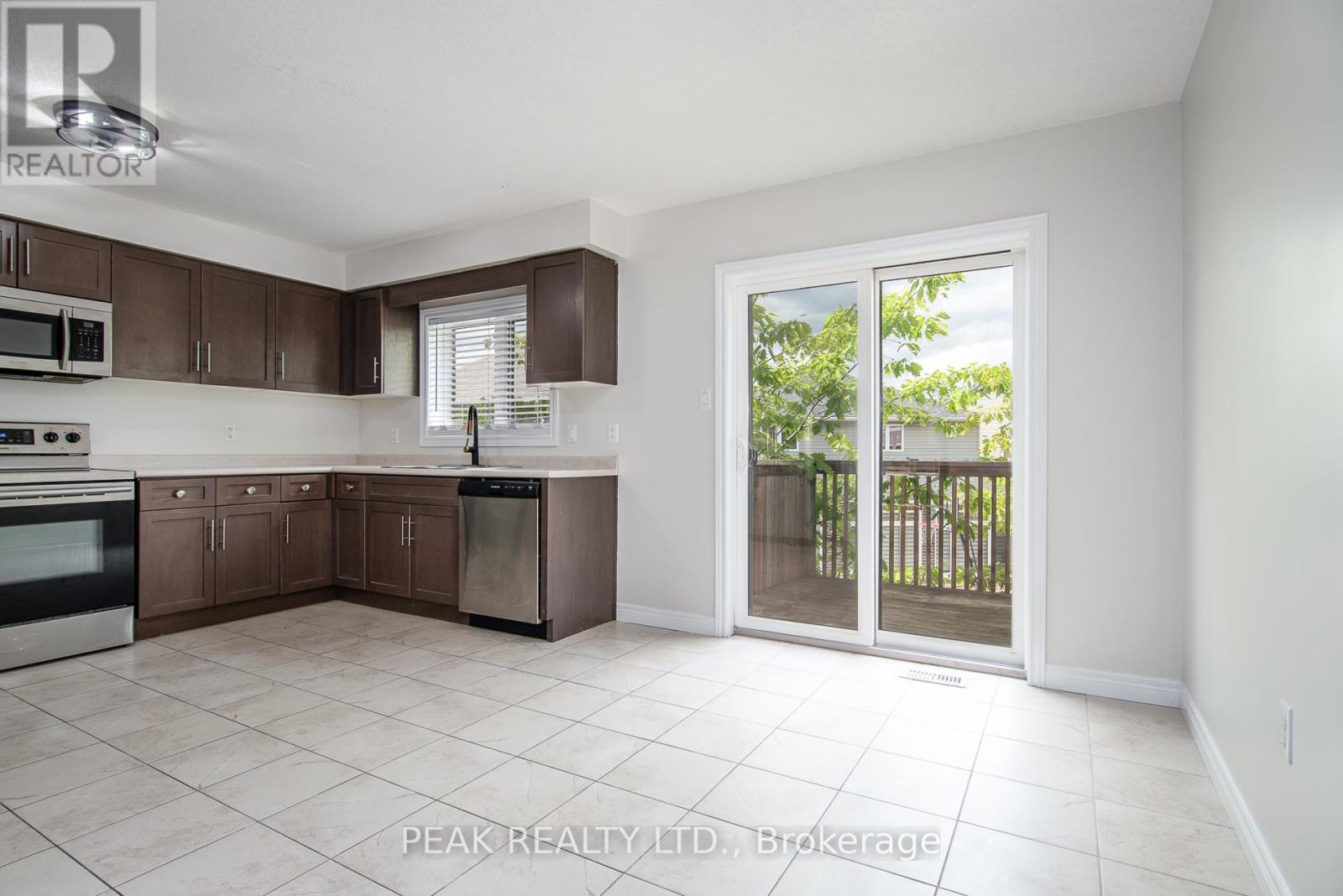 Photo 8 of J 3 70 Willowrun Drive, Kitchener ON