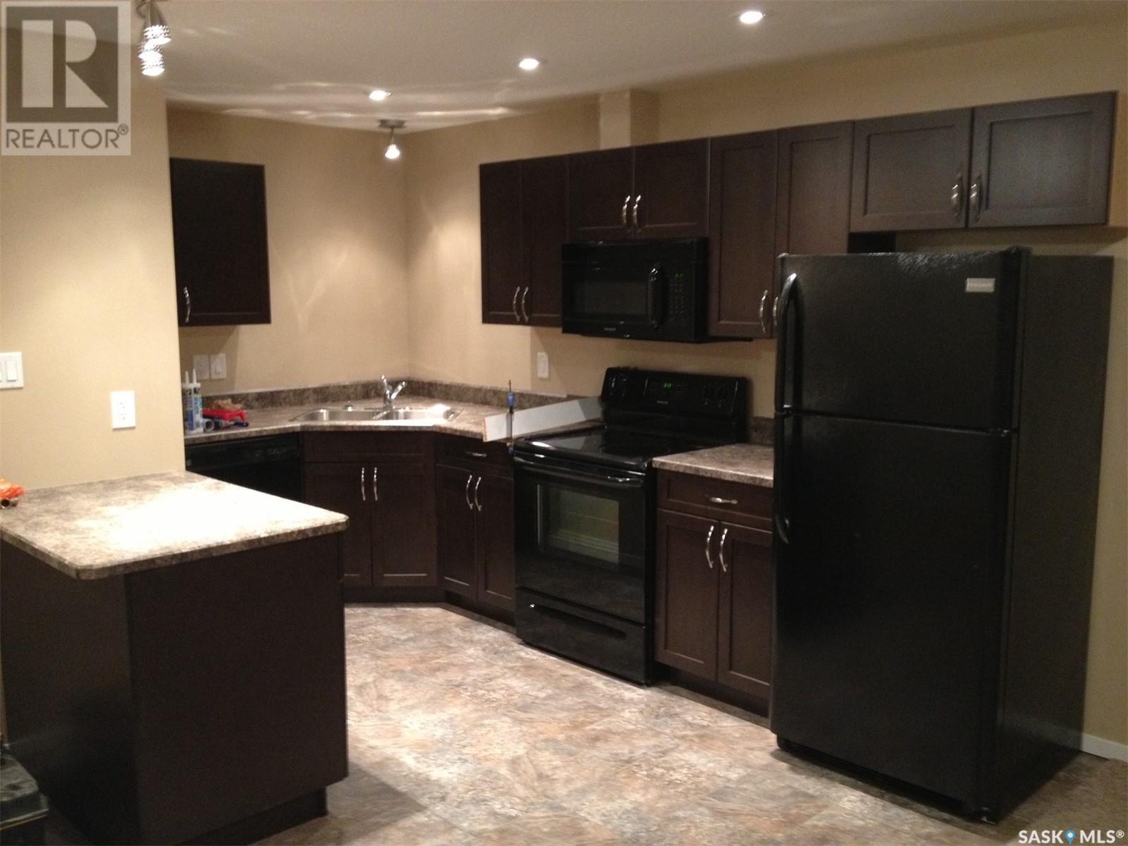 Photo 11 of 119 St John Street N, Regina SK