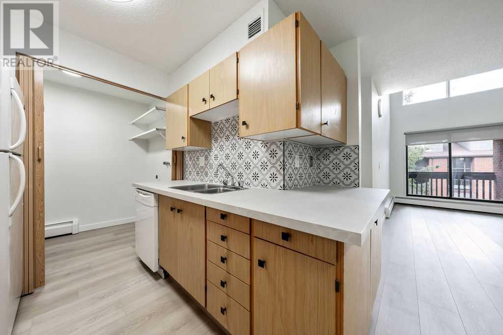 Single Family House Multi-level for Sale in B  A Street SW Kingsland Calgary 