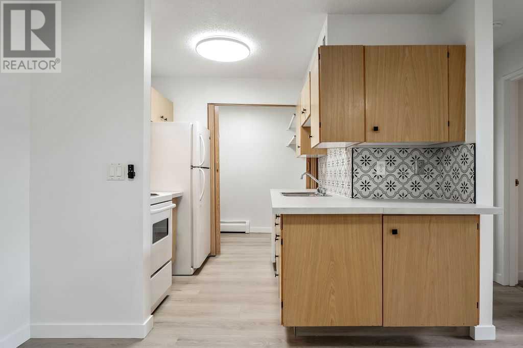 Single Family House Multi-level for Sale in B  A Street SW Kingsland Calgary 