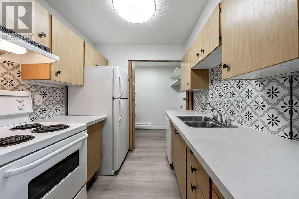Single Family House Multi-level for Sale in B  A Street SW Kingsland Calgary 