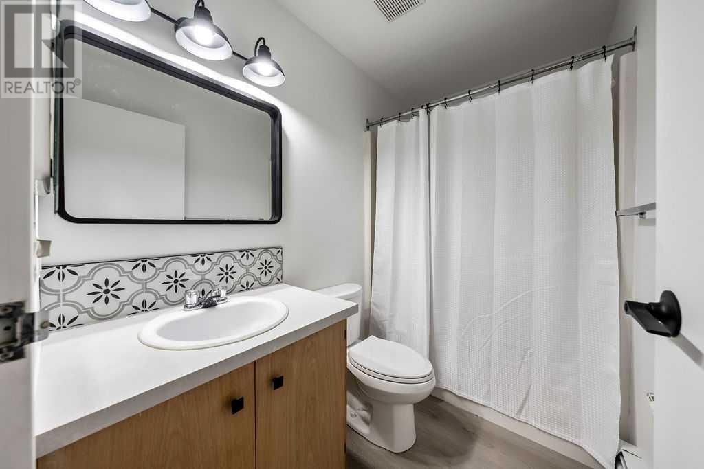 Single Family House Multi-level for Sale in B  A Street SW Kingsland Calgary 