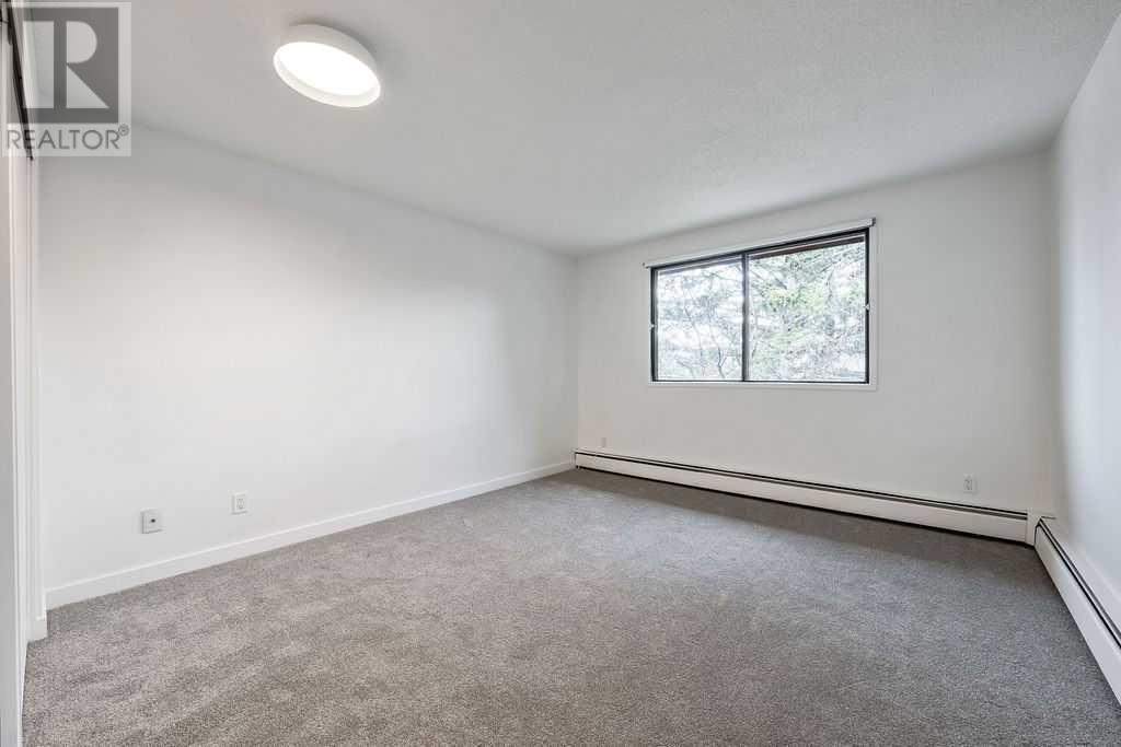 Single Family House Multi-level for Sale in B  A Street SW Kingsland Calgary 