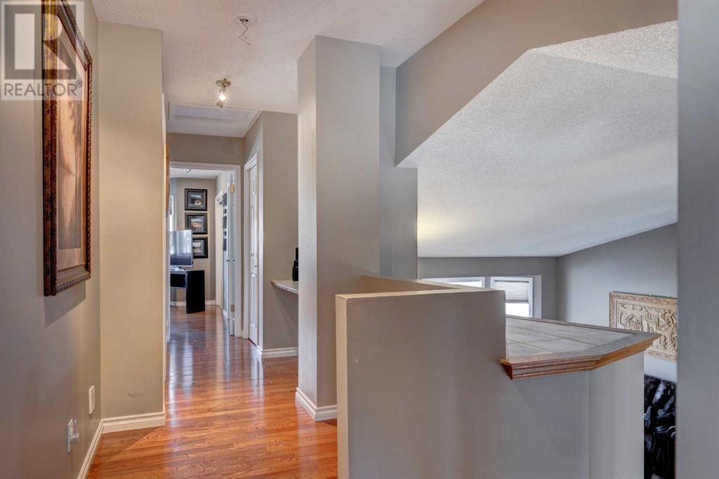 Single Family House 4 Level for Sale in  Macewan Ridge Close NW MacEwan Glen Calgary 