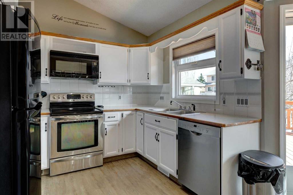 Single Family House 4 Level for Sale in  Macewan Ridge Close NW MacEwan Glen Calgary 