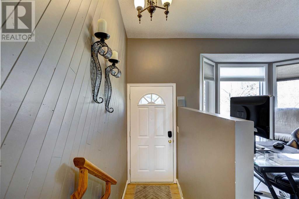 Single Family House 4 Level for Sale in  Macewan Ridge Close NW MacEwan Glen Calgary 