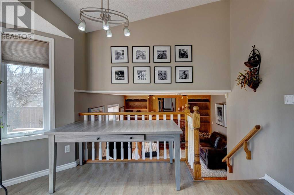 Single Family House 4 Level for Sale in  Macewan Ridge Close NW MacEwan Glen Calgary 