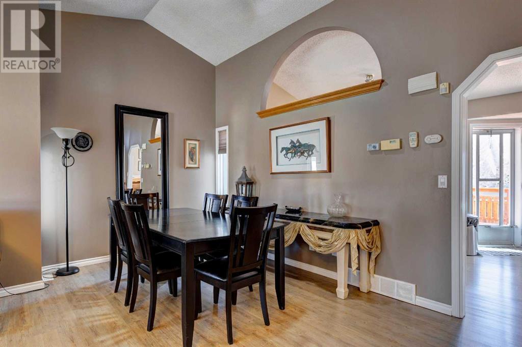 Single Family House 4 Level for Sale in  Macewan Ridge Close NW MacEwan Glen Calgary 