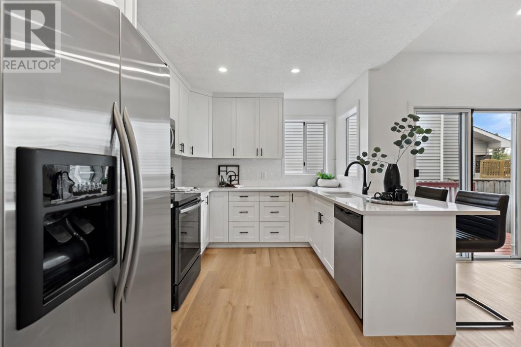 Single Family House 4 Level for Sale in   Street SE Riverbend Calgary 