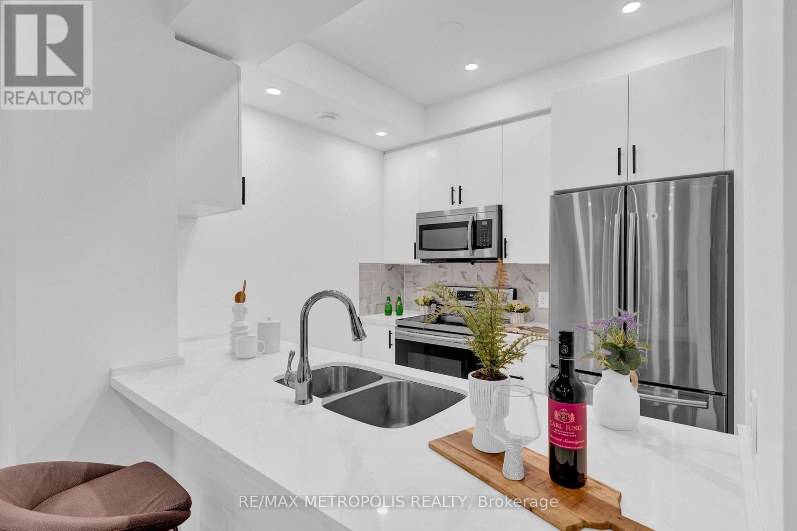 Photo 38 of Th 55 295 Village Green Square, Toronto ON