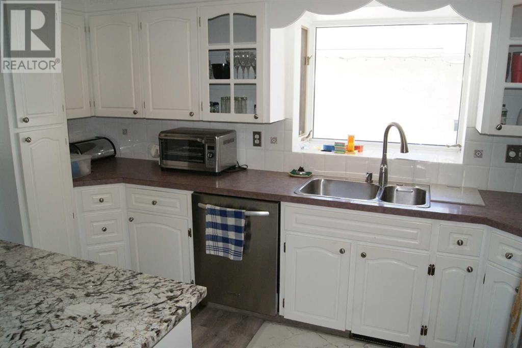 Single Family House 4 Level for Sale in   Avenue SW Cedarbrae Calgary 