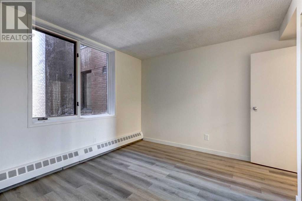 Single Family House for Sale in    Avenue SE Chinatown Calgary 