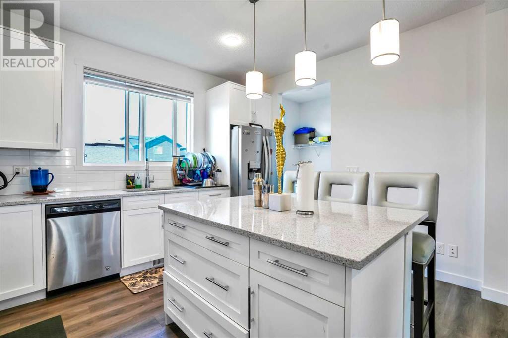 Single Family House for Sale in  Belmont Avenue SW Belmont Calgary 