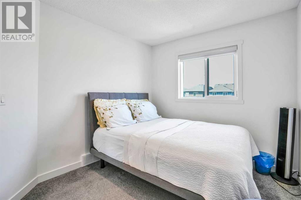 Single Family House for Sale in  Belmont Avenue SW Belmont Calgary 