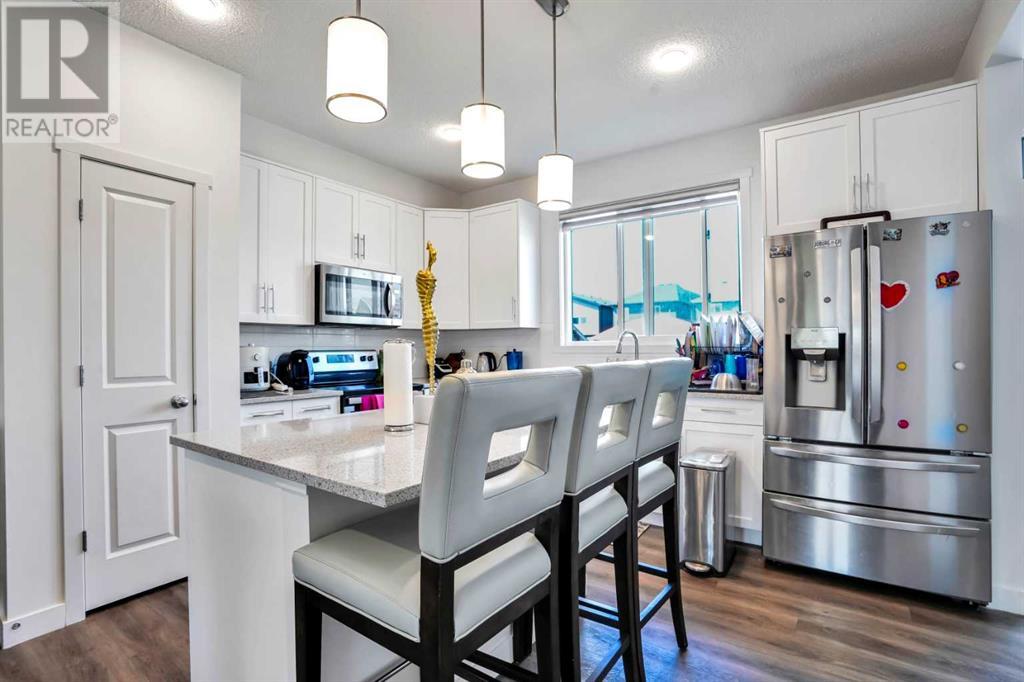 Single Family House for Sale in  Belmont Avenue SW Belmont Calgary 