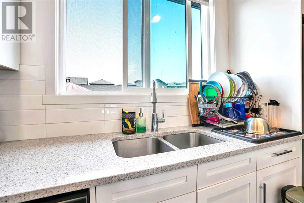 Single Family House for Sale in  Belmont Avenue SW Belmont Calgary 