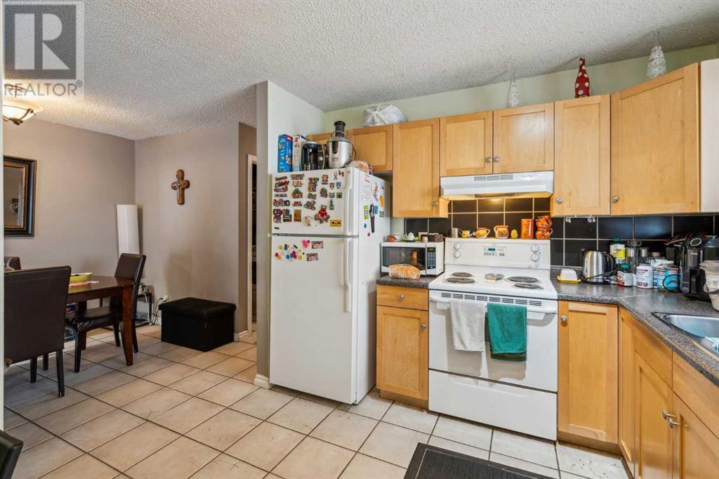 Multi-family House Bungalow for Sale in  and   Avenue NE Renfrew Calgary 