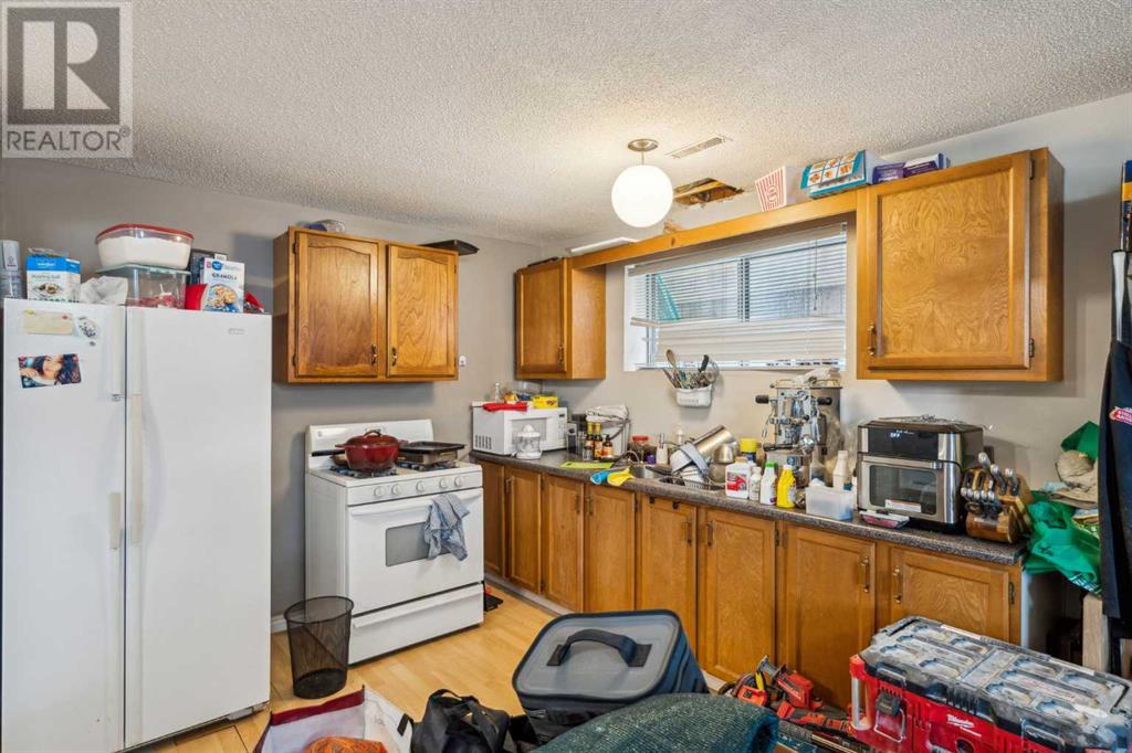 Multi-family House Bungalow for Sale in  and   Avenue NE Renfrew Calgary 