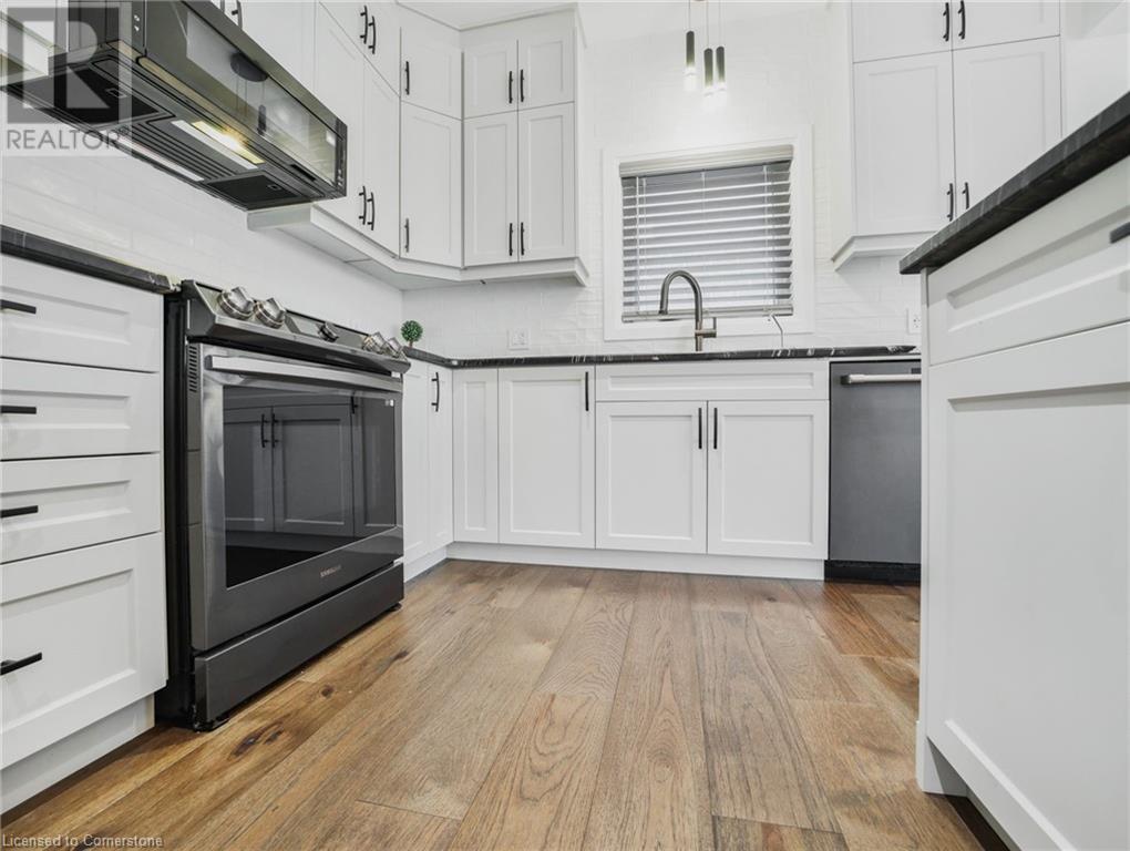 Photo 11 of 75 Monarch Woods Drive, Kitchener ON