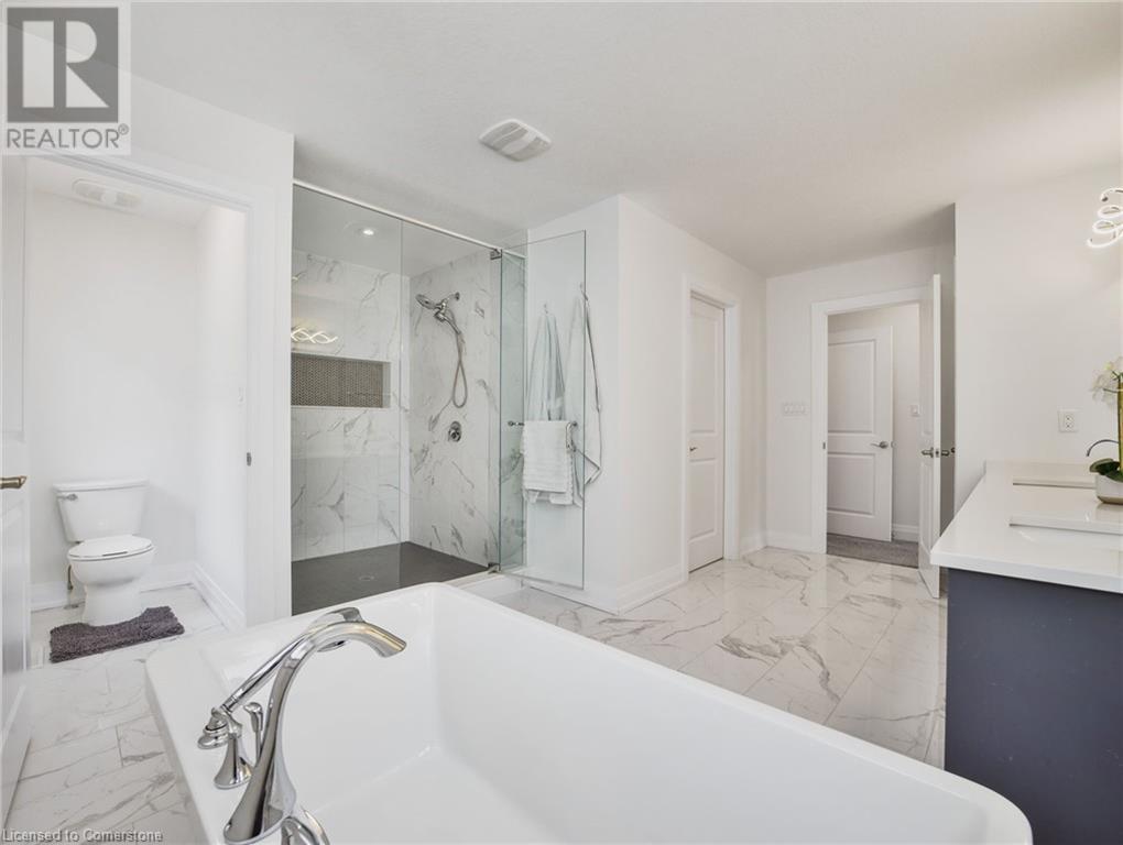 Photo 25 of 75 Monarch Woods Drive, Kitchener ON