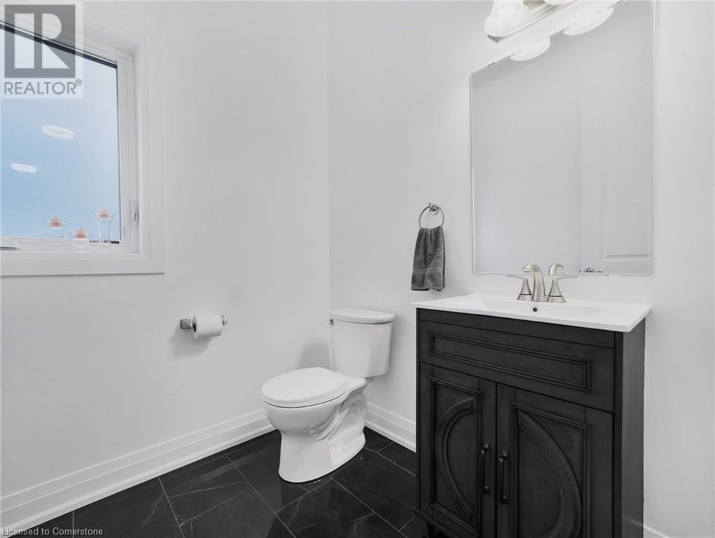 Photo 28 of 75 Monarch Woods Drive, Kitchener ON