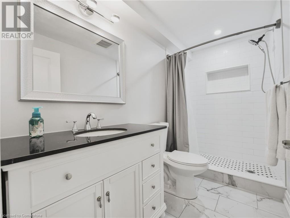 Photo 33 of 75 Monarch Woods Drive, Kitchener ON