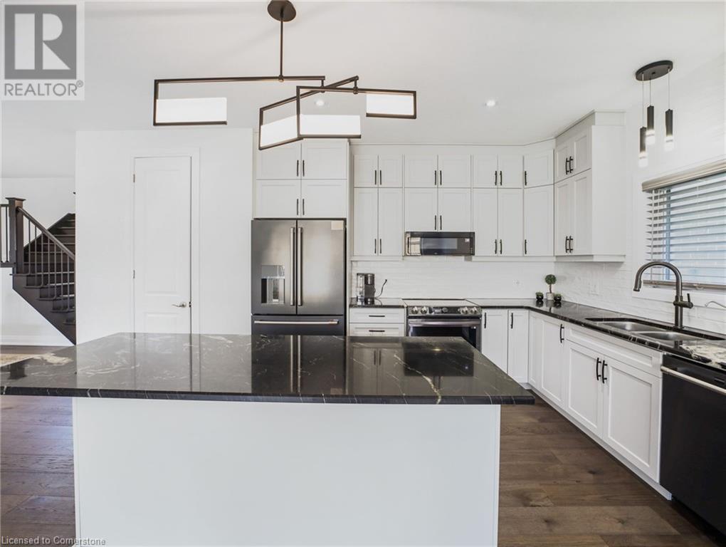 Photo 9 of 75 Monarch Woods Drive, Kitchener ON