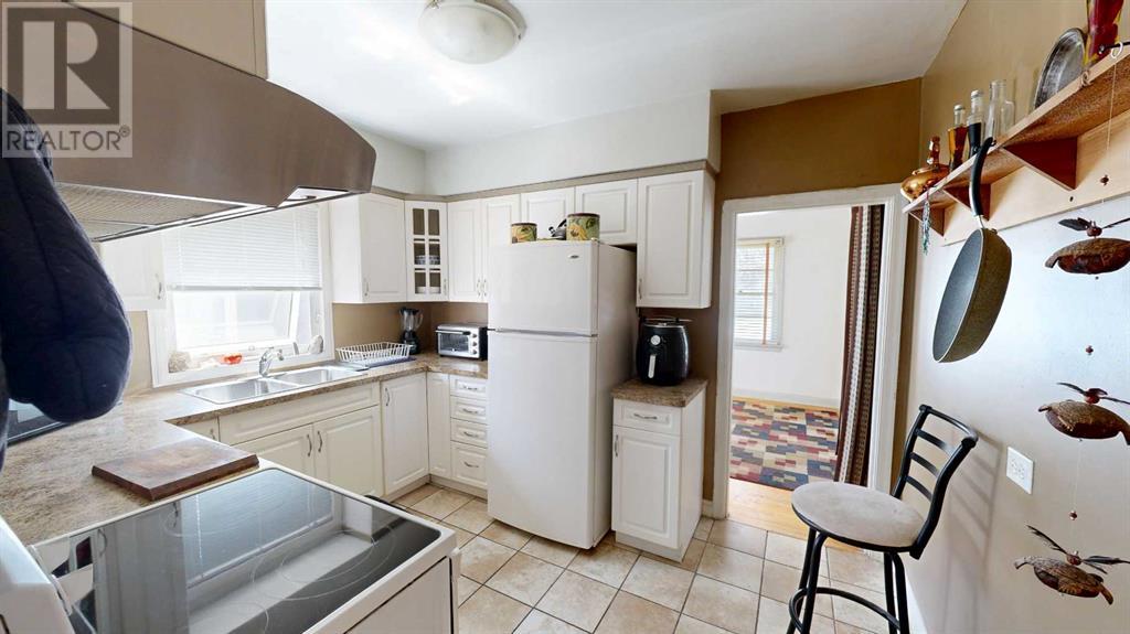 Single Family House Bungalow for Sale in   Street S Victoria Park Lethbridge 