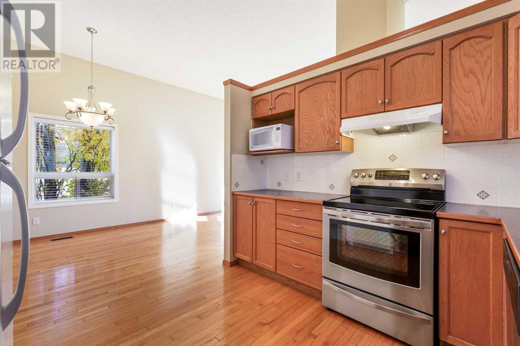 Single Family House 4 Level for Sale in  Eversyde Circle SW Evergreen Calgary 